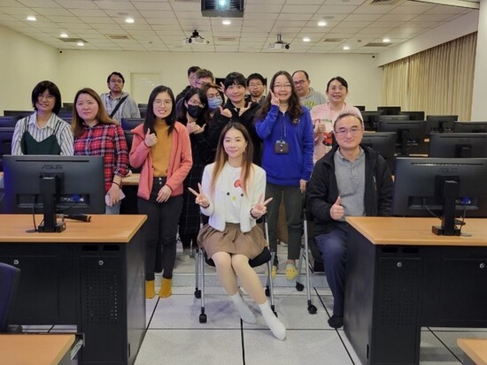 Group photo and participants listening attentively.(Open new window/jpg file)Image